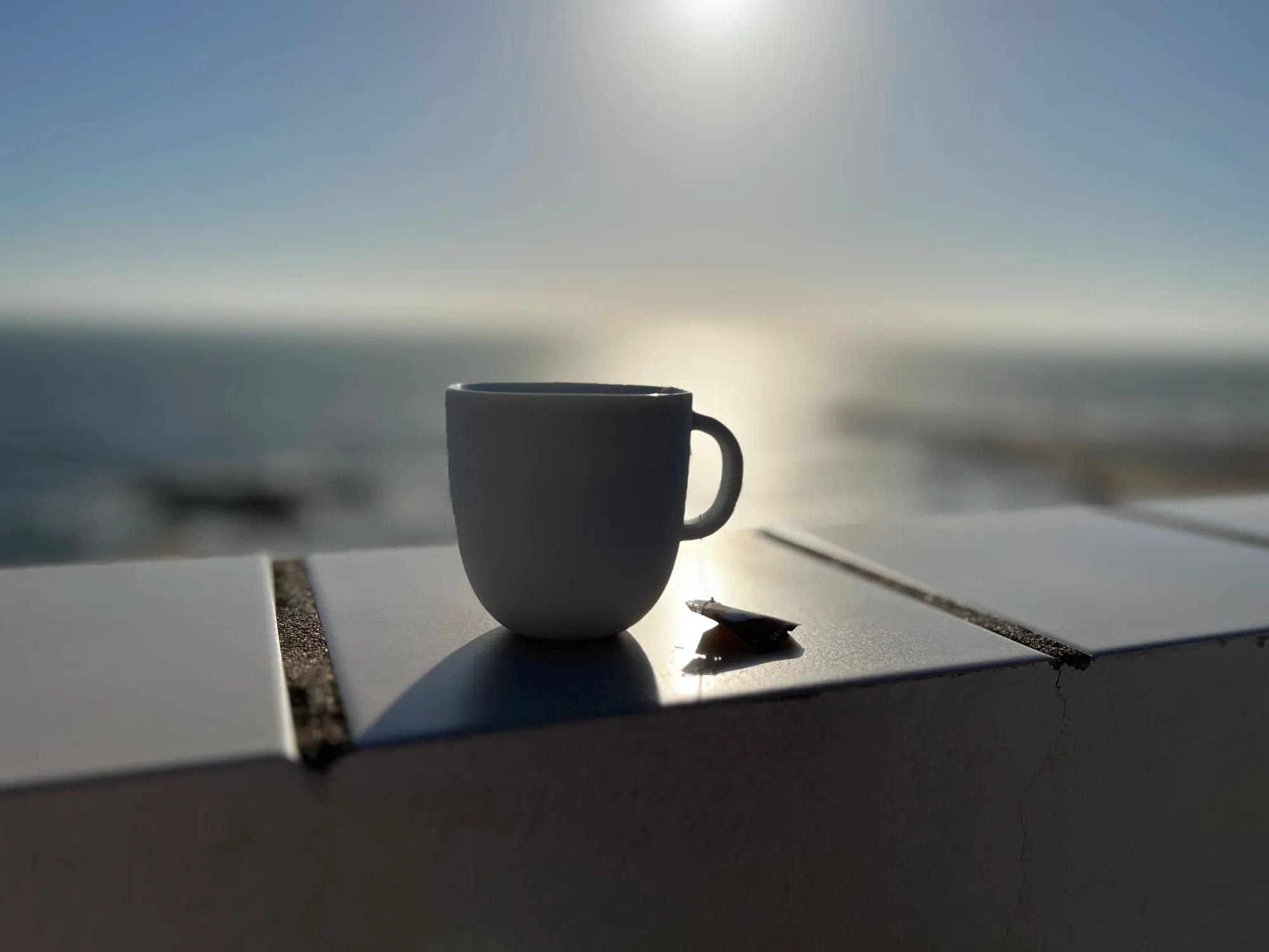 A coffee on a balcony with a view of the sea